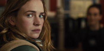 Movie still from “Books of Blood” (2020), directed by Brannon Braga – A person with long hair; Close Up shot, Over the shoulder angle