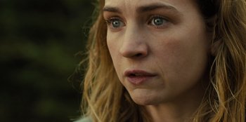 Movie still from “Books of Blood” (2020), directed by Brannon Braga – A woman's face with blue eyes; Close Up shot, Low angle