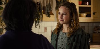 Movie still from “Books of Blood” (2020), directed by Brannon Braga – A young woman standing in front of a mirror; Close Up shot, Over the shoulder angle