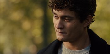 Movie still from “Books of Blood” (2020), directed by Brannon Braga – A person wearing a sweater; Close Up shot, Over the shoulder angle