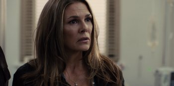 Movie still from “Books of Blood” (2020), directed by Brannon Braga – A person with long brown hair; Close Up shot, Over the shoulder angle