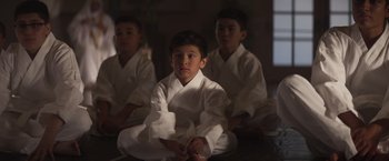 Movie still from “Born a Champion” (2021), directed by Alex Ranarivelo – Close Up shot, Low angle