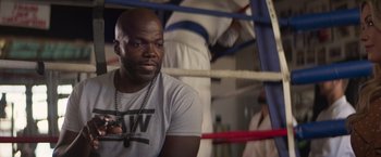 Movie still from “Born a Champion” (2021), directed by Alex Ranarivelo – Close Up shot, Low angle