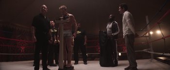 Movie still from “Born a Champion” (2021), directed by Alex Ranarivelo – Wide shot, Low angle