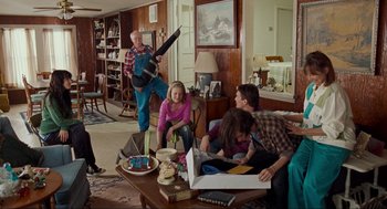 Movie still from “Boyhood” (2014), directed by Richard Linklater – A group of people sitting around a living room; Wide shot, Over the shoulder angle