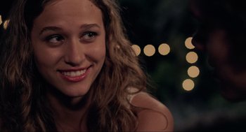 Movie still from “Boyhood” (2014), directed by Richard Linklater – A woman smiling for the camera; Close Up shot, Over the shoulder angle