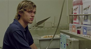 Movie still from “Boyhood” (2014), directed by Richard Linklater – A man sitting in front of a computer monitor; Close Up shot, Low angle