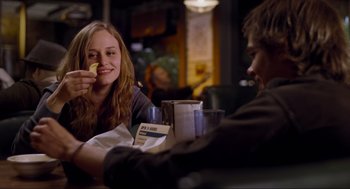 Movie still from “Boyhood” (2014), directed by Richard Linklater – A woman sitting at a table with a man in front of her; Close Up shot, Over the shoulder angle