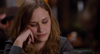Movie still from “Boyhood” (2014), directed by Richard Linklater – A woman sitting down with her head resting on her hand; Close Up shot, Over the shoulder angle