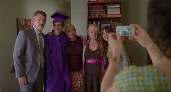 Movie still from “Boyhood” (2014), directed by Richard Linklater – A group of people taking a picture of a group of people; Wide shot, Over the shoulder angle