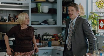 Movie still from “Boyhood” (2014), directed by Richard Linklater – A man and a woman standing in a kitchen next to each other; Medium shot, Over the shoulder angle