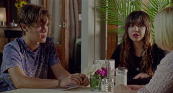 Movie still from “Boyhood” (2014), directed by Richard Linklater – A man and a woman sitting at a table; Medium shot, Over the shoulder angle