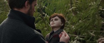 Movie still from “Brahms: The Boy II” (2020), directed by William Brent Bell – A man and a boy are looking at each other; Close Up shot, Over the shoulder angle