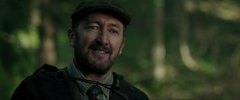 Movie still from “Brahms: The Boy II” (2020), directed by William Brent Bell – A person wearing a hat; Close Up shot, Over the shoulder angle