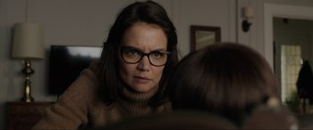 Movie still from “Brahms: The Boy II” (2020), directed by William Brent Bell – A person wearing glasses; Close Up shot, Over the shoulder angle
