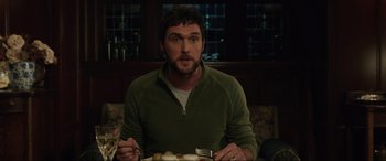 Movie still from “Brahms: The Boy II” (2020), directed by William Brent Bell – A person sitting in front of a plate of food; Close Up shot, Over the shoulder angle