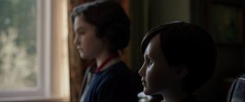 Movie still from “Brahms: The Boy II” (2020), directed by William Brent Bell – A boy and a girl standing next to each other; Close Up shot, Over the shoulder angle