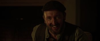 Movie still from “Brahms: The Boy II” (2020), directed by William Brent Bell – A person wearing a hat; Close Up shot, Over the shoulder angle