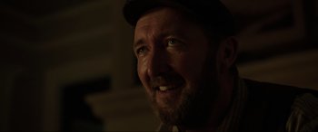 Movie still from “Brahms: The Boy II” (2020), directed by William Brent Bell – A person wearing a hat; Close Up shot, Low angle