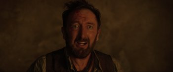 Movie still from “Brahms: The Boy II” (2020), directed by William Brent Bell – A person with a beard; Close Up shot, Over the shoulder angle