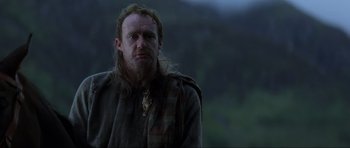 Movie still from “Braveheart” (1995), directed by Mel Gibson – A person with long hair; Close Up shot, Low angle