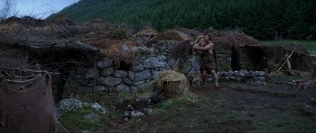 Movie still from “Braveheart” (1995), directed by Mel Gibson – A couple of people that are in the dirt; Wide shot, Low angle