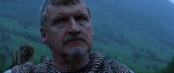 Movie still from “Braveheart” (1995), directed by Mel Gibson – A person with a beard; Close Up shot, Low angle