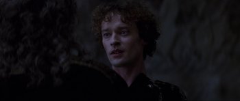 Movie still from “Braveheart” (1995), directed by Mel Gibson – A person with curly hair; Close Up shot, Over the shoulder angle