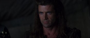 Movie still from “Braveheart” (1995), directed by Mel Gibson – A person with long hair; Close Up shot, Over the shoulder angle