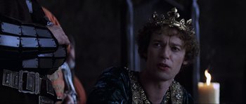 Movie still from “Braveheart” (1995), directed by Mel Gibson – A person wearing a crown; Close Up shot, Over the shoulder angle