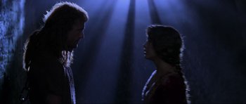 Movie still from “Braveheart” (1995), directed by Mel Gibson – A man and a woman standing next to each other; Close Up shot, Over the shoulder angle