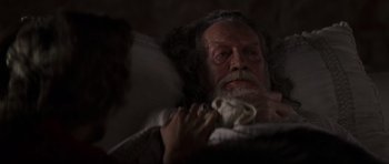 Movie still from “Braveheart” (1995), directed by Mel Gibson – An old man with long white hair and a white beard; Close Up shot, High angle