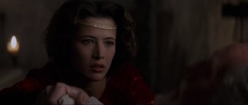 Movie still from “Braveheart” (1995), directed by Mel Gibson – A person wearing a headband; Close Up shot, Over the shoulder angle