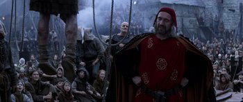 Movie still from “Braveheart” (1995), directed by Mel Gibson – A group of people sitting on top of a boat; Medium shot, Over the shoulder angle