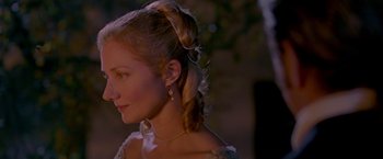 Movie still from “The Patriot” (2000), directed by Roland Emmerich – A beautiful woman with long blonde hair wearing a white dress; Close Up shot, Over the shoulder angle