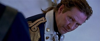 Movie still from “The Patriot” (2000), directed by Roland Emmerich – A person wearing a uniform; Close Up shot, Over the shoulder angle