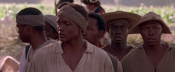 Movie still from “The Patriot” (2000), directed by Roland Emmerich – A group of men standing next to each other; Close Up shot, Over the shoulder angle