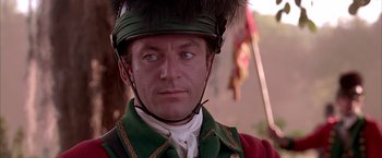 Movie still from “The Patriot” (2000), directed by Roland Emmerich – A person wearing a helmet; Close Up shot, Over the shoulder angle