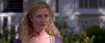 Movie still from “The Patriot” (2000), directed by Roland Emmerich – A person with long blonde hair; Close Up shot, Over the shoulder angle