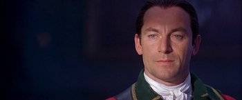 Movie still from “The Patriot” (2000), directed by Roland Emmerich – A person wearing a military uniform; Close Up shot, Over the shoulder angle