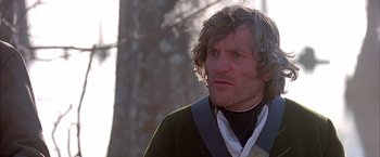 Movie still from “The Patriot” (2000), directed by Roland Emmerich – A person with long hair; Close Up shot, Low angle