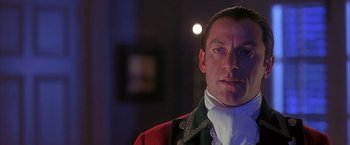 Movie still from “The Patriot” (2000), directed by Roland Emmerich – A person wearing a costume; Close Up shot, Low angle