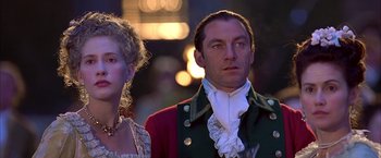 Movie still from “The Patriot” (2000), directed by Roland Emmerich – A man and a woman standing next to each other; Close Up shot, Low angle