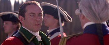 Movie still from “The Patriot” (2000), directed by Roland Emmerich – A person wearing a hat; Close Up shot, Over the shoulder angle