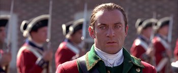 Movie still from “The Patriot” (2000), directed by Roland Emmerich – A person wearing a uniform; Close Up shot, Over the shoulder angle