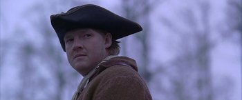 Movie still from “The Patriot” (2000), directed by Roland Emmerich – A person wearing a hat; Close Up shot, Low angle