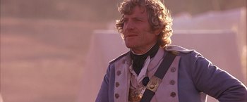 Movie still from “The Patriot” (2000), directed by Roland Emmerich – A person wearing a uniform; Close Up shot, Over the shoulder angle