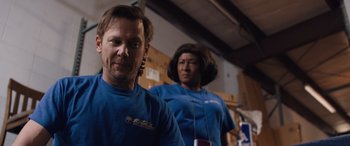 Movie still from “Breaking News in Yuba County” (2021), directed by Tate Taylor – A man and a woman standing next to each other; Close Up shot, Low angle