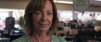 Movie still from “Breaking News in Yuba County” (2021), directed by Tate Taylor – A person wearing a green shirt; Close Up shot, Over the shoulder angle