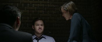 Movie still from “Broken” (2021), directed by Patrick Phillips – A man and a woman talking to each other; Medium shot, Over the shoulder angle